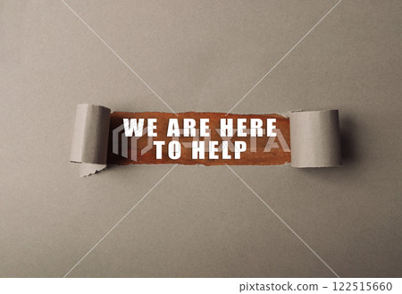 Torn piece of paper with the words We are here to help written on it 122515660