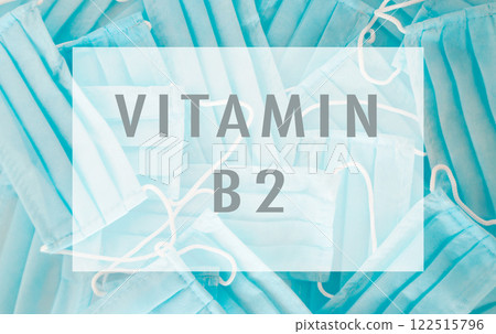 Blue background with a white and blue word that says vitamin b2 122515796