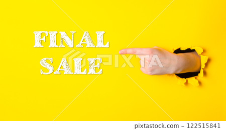 Hand pointing to the word final sale on a yellow background Hand pointing to the word final sale on a yellow background 122515841