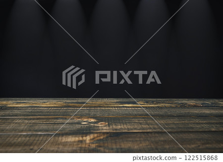 Wooden table with a black background Wooden table with a black background 122515868