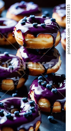 A tempting stack of freshly made blueberry wildberry donuts drizzled with rich glaze, showcasing vibrant berries on top, perfect for dessert cravings at any time of the day. Generative AI 122516155