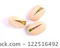 3 pistachios photographed from directly above 122516492