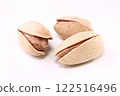 Pistachios, 3 pieces, white background, thin skin, brown 122516496