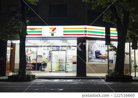 Night view of 7-Eleven convenience stores chain in downtown Taipei, Taiwan.  122516660