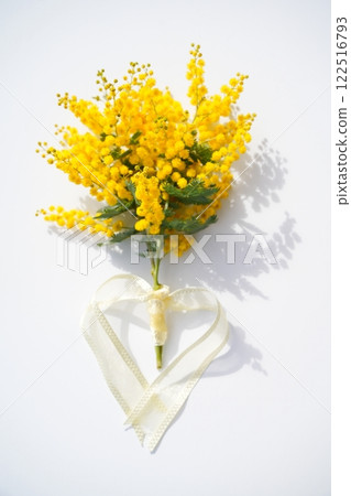A bouquet of mimosa flowers in the sunlight 122516793