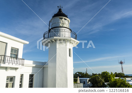 Close-up of Cihou Lighthouse with a blue sky background in Kaohsiung, Taiwan. Close-up of Cihou Lighthouse with a blue sky background in Kaohsiung, Taiwan. 122516816