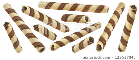 Waffle rolls, striped chocolate and vanilla wafer sticks isolated on white background, full depth of field, package design element Waffle rolls, striped chocolate and vanilla wafer sticks isolated on white background, full depth of field, package design element 122517043
