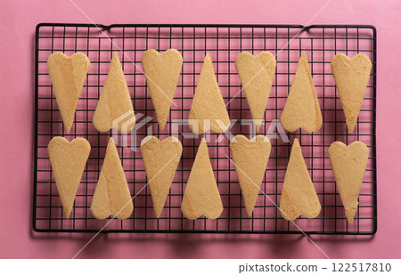 Decorative Heart and Cone Shapes on Pink Background 122517810