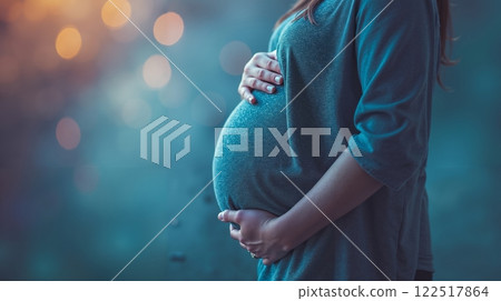 A pregnant woman with her hands on her belly A pregnant woman with her hands on her belly 122517864