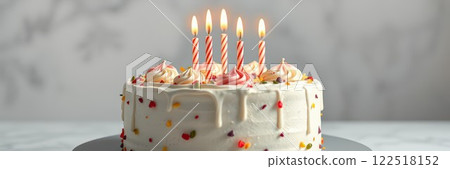 Birthday cake with five candles and decorations ready for celebration 122518152