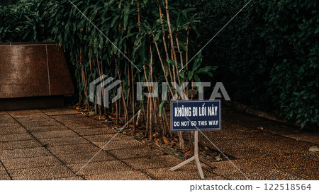 A Do Not Enter Sign Has Been Placed in the Lush, Vibrant, and Green Surroundings of Nature 122518564