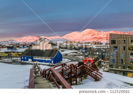 Nuuk city center streets with colorful Inuit houses covered in snow Nuuk with mountains in the background, Greenland Nuuk city center streets with colorful Inuit houses covered in snow Nuuk with mountains in the background, Greenland 122520082