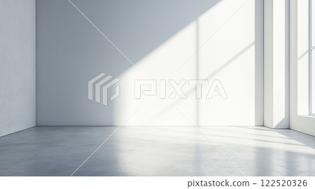 Light streams into a minimalist room with smooth white walls and polished concrete floor, creating a serene atmosphere during daylight hours Light streams into a minimalist room with smooth white walls and polished concrete floor, creating a serene atmosphere during daylight hours 122520326