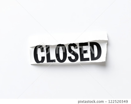 A piece of paper that has the word closed written on it clearly A piece of paper that has the word closed written on it clearly 122520349