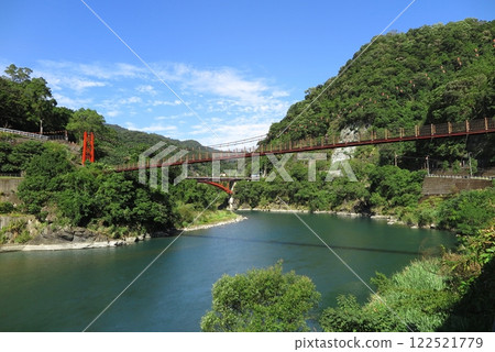 Wulai, a hot spring resort in the mountains near Taipei: Nanshi River flows through the center and the surrounding mountains. Wulai, a hot spring resort in the mountains near Taipei: Nanshi River flows through the center and the surrounding mountains. 122521779