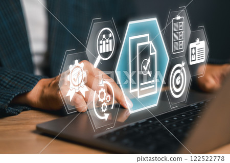 Futuristic digital audit interface on a laptop screen, symbolizing modern business and financial analysis. 122522778