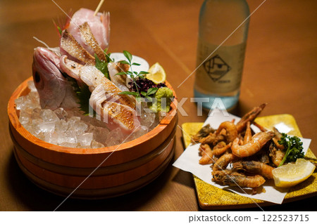 Hokuriku specialty seared rosy seabass sashimi platter and gasu shrimp tempura 122523715
