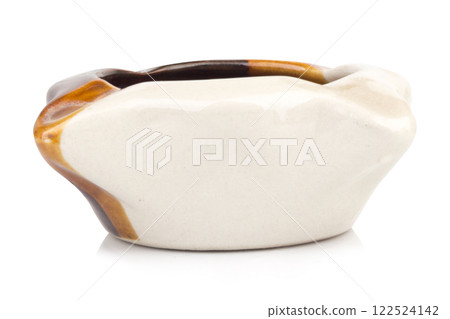 Ceramic ashtray isolated on white background Ceramic ashtray isolated on white background 122524142