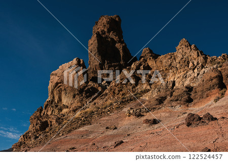 Massive rocky cliff with 122524457