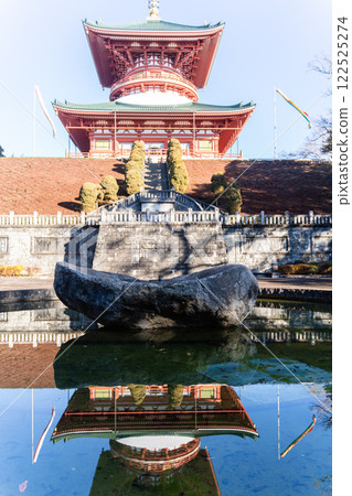 Naritasan's Great Peace Pagoda reflected on the water Naritasan's Great Peace Pagoda reflected on the water 122525274