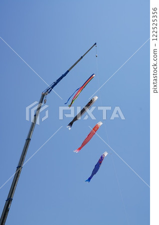Carp streamer on a crane Carp streamer on a crane 122525356