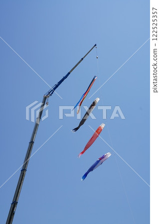 Carp streamer on a crane Carp streamer on a crane 122525357