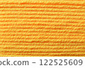 macro picture of yellow color thread texture abstract close up fabric background textile surface wallpaper template for banner website backdrop poster 122525609