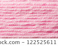 macro picture of pink color thread texture abstract close up fabric background textile surface wallpaper template for banner website backdrop poster 122525611
