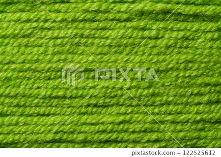 macro picture of green color thread texture abstract close up fabric background textile surface wallpaper template for banner website backdrop poster 122525612