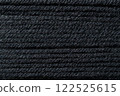 macro picture of black color thread texture abstract close up fabric background textile surface wallpaper template for banner website backdrop poster 122525615