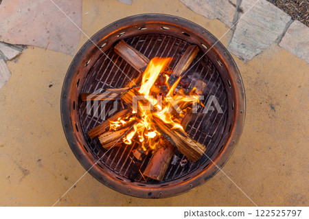 Bonfire Outdoor campfire flames at campsite 122525797