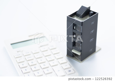 Corporate building and calculator 122526392