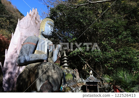 Statue of Acala standing above Kegon Falls in Chichibu 122526413
