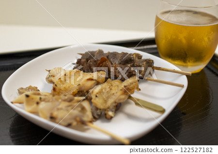 Salted yakitori skewers and beer Salted yakitori skewers and beer 122527182