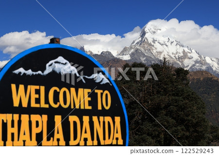 roadsigns of Thapla Danda that the viewpoint for panoramic Himalayan vistas in poonhill trekking circle with the height of 3165 roadsigns of Thapla Danda that the viewpoint for panoramic Himalayan vistas in poonhill trekking circle with the height of 3165 122529243