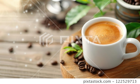 A cup of coffee with beans and leaves on a wooden surface. A cup of coffee with beans and leaves on a wooden surface. 122529713