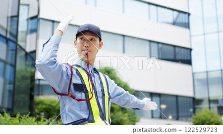 Traffic controller directing traffic 122529723