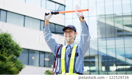 Traffic controller directing traffic 122529726