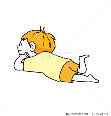 A boy lying down with his chin on his hands A boy lying down with his chin on his hands 122530941