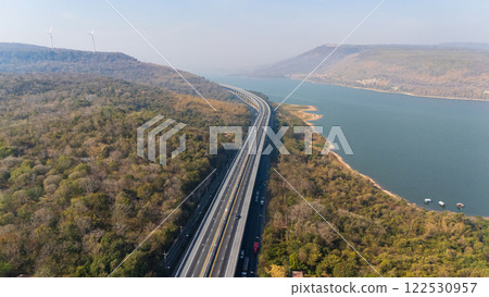 Drone shot aerial view landscape of the M6  motorway Expressway Nakhon Ratchasima Province - Bang Pa-in. Lam Ta Khong River and Mountain. Drone shot of scenic landscape rural place traffic. Nakhon 122530957