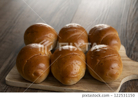 Breakfast scene with butter roll 122531150