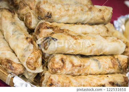 Aromatic crunchy spring rolls with meat and vegetables. Traditional Chinese cuisine 122531658