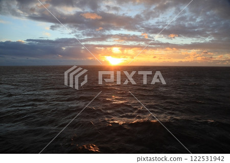 Sunrise seen from a boat on the Pacific Ocean Sunrise seen from a boat on the Pacific Ocean 122531942