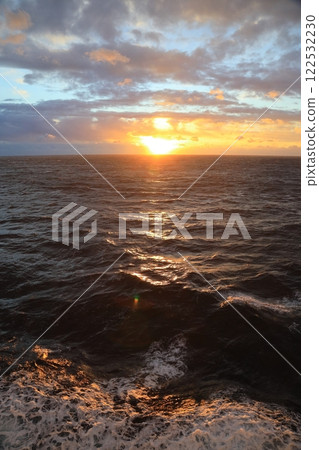 Sunrise seen from the ship Sunrise seen from the ship 122532230