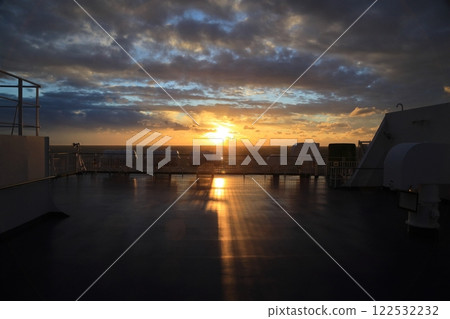 Sunrise shining on the deck of a ferry Sunrise shining on the deck of a ferry 122532232