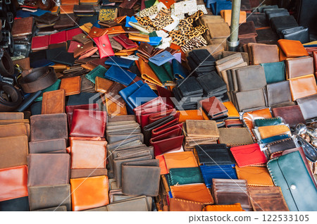 handmade leather wallets and accessories on counter at a street market in Hoi An in Vietnam in Asia handmade leather wallets and accessories on counter at a street market in Hoi An in Vietnam in Asia 122533105