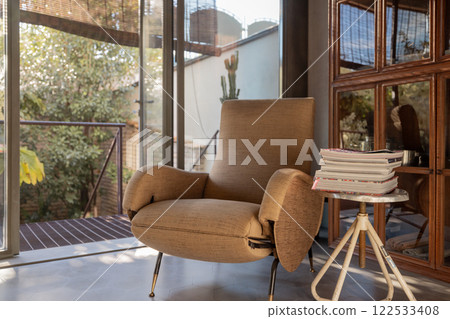 Cozy Reading Corner with Vintage Armchair Cozy Reading Corner with Vintage Armchair 122533408