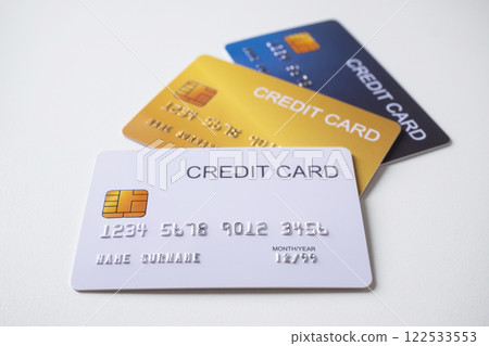 Pile of credit cards on white background. Cashless technology and credit card payment concept. 122533553