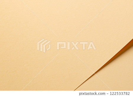 A beige cream paper background with a neutral and premium aesthetic, featuring a soft and smooth A beige cream paper background with a neutral and premium aesthetic, featuring a soft and smooth 122533782