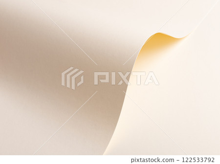 A beige paper background with a soft, natural texture and a warm, timeless appeal. Its smooth, matte 122533792